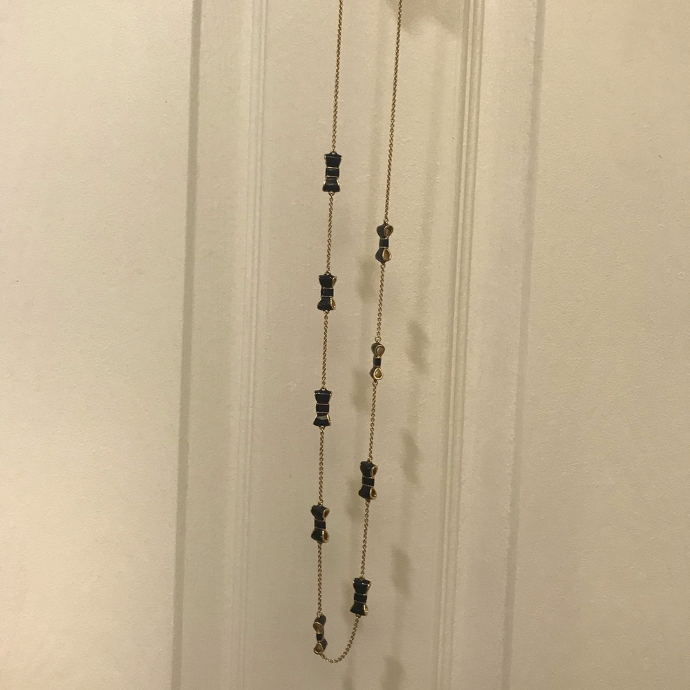 Kate Spade black n gld enamel bow station necklace